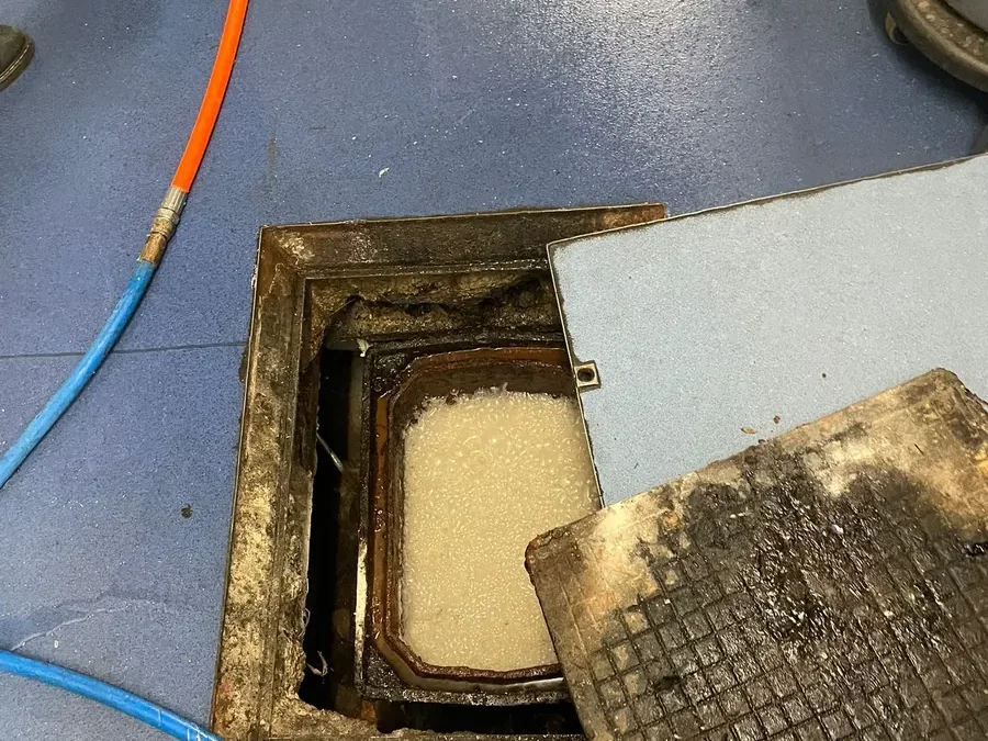 Complete Drain Services engineers on a commercial site