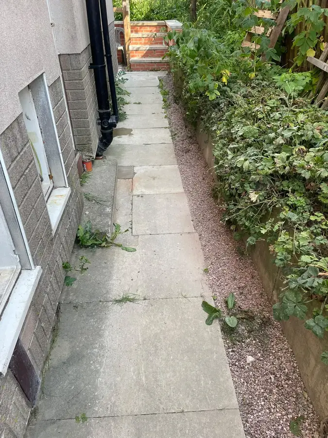 The side path cleaned up and reinstated after the repair on Airdrie Crescent