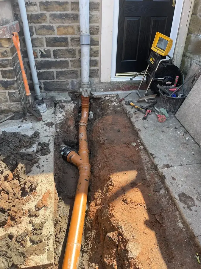 New pipework installed in the excavated trench on Albion Street, Padiham