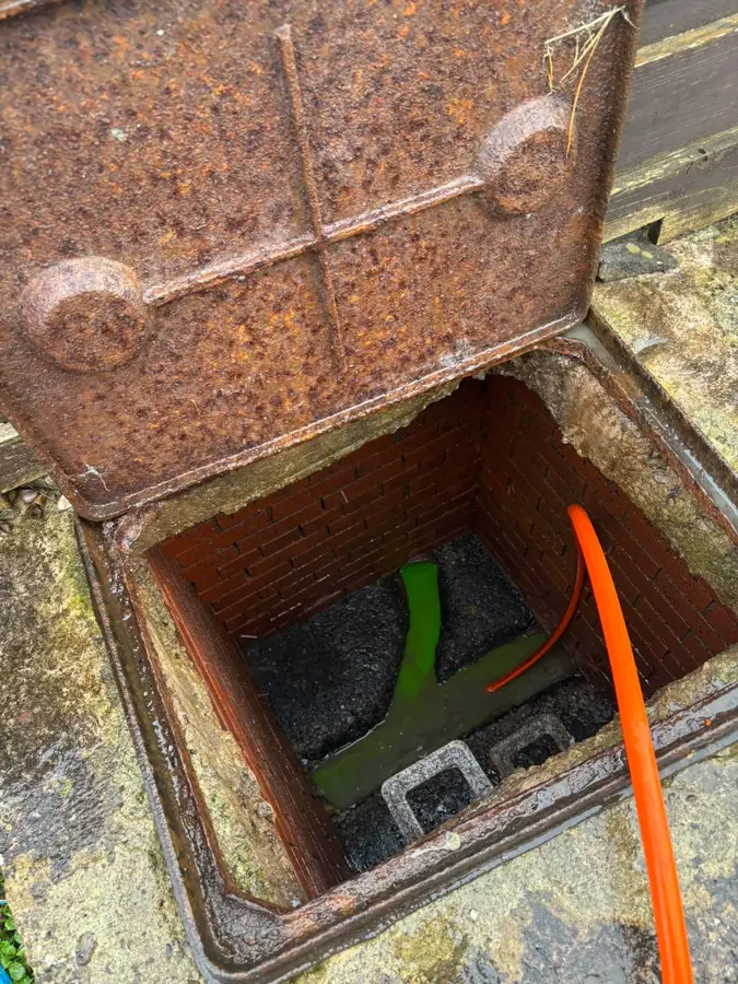 The manhole at the side of the property on Finsley View, Briercliffe