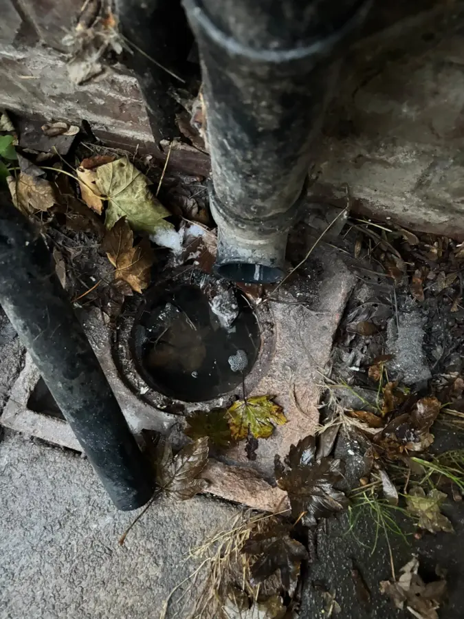 The soil pipe and gully at the back of the property on Hurstwood Avenue, Burnley