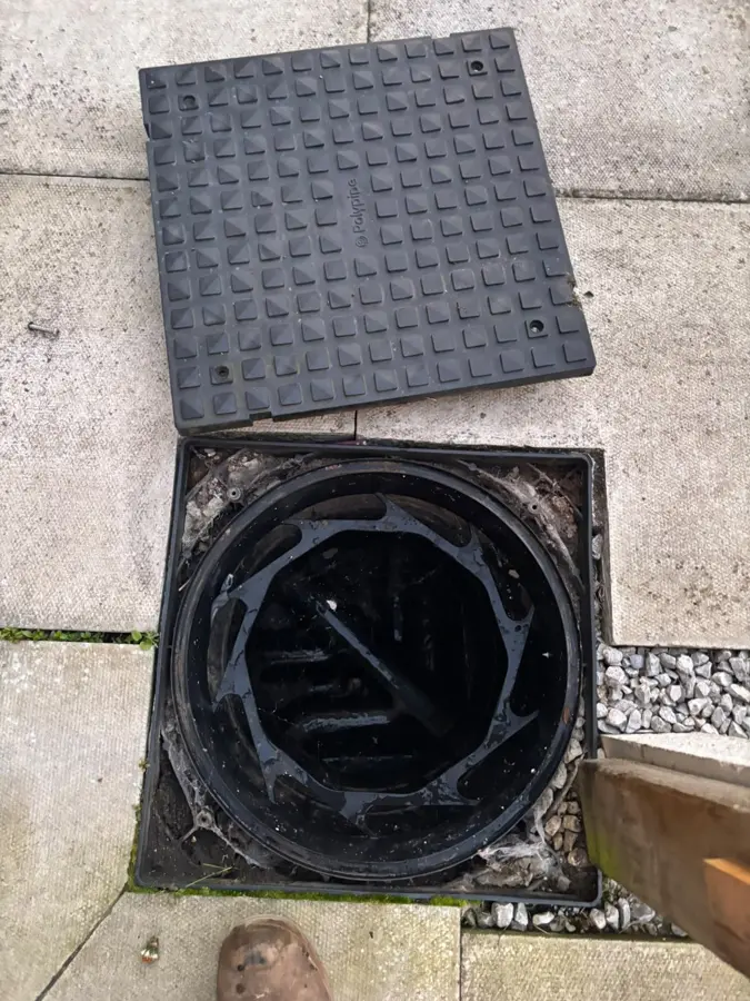 The manhole cover lifted on Station Road, Padiham